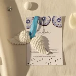 marturie botez baiat aripi ceramice cu cartonas gogosi albastre