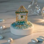marturie botez baiat carusel auriu pe baza ceramica cu pietre albastre